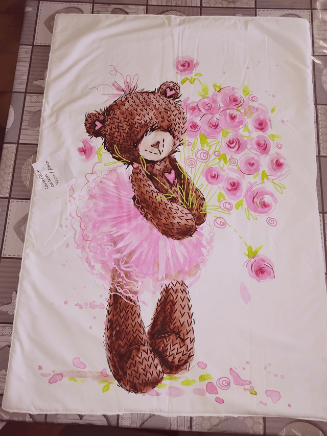 Couverture taille 73 cm de largeur/ 1m04 de hauteur